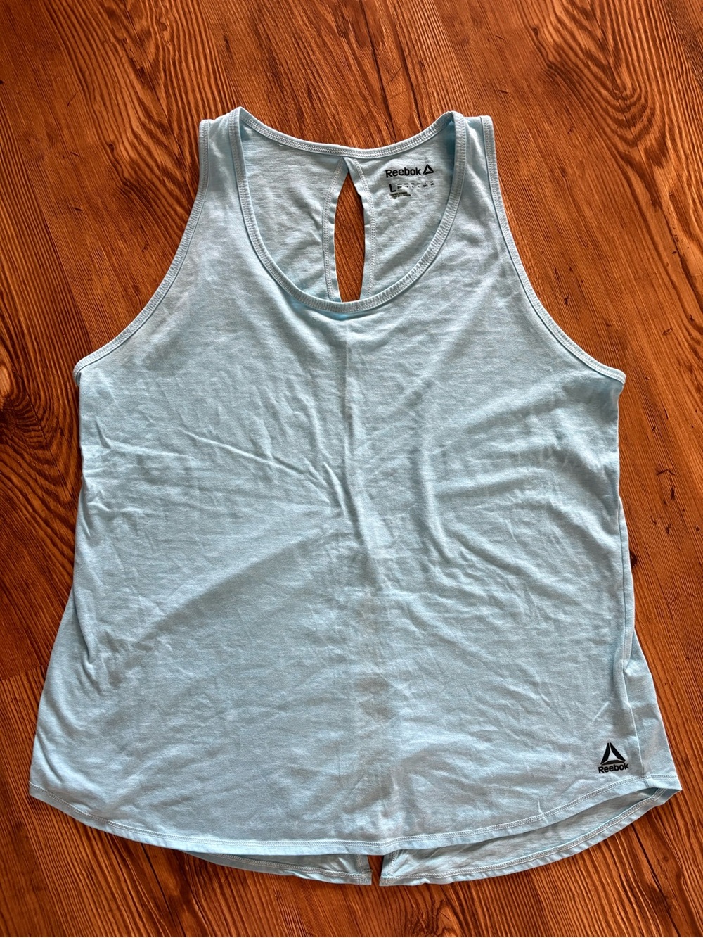Reebok baby blue tank top slit back athletic workout sleeveless shirt women’s L